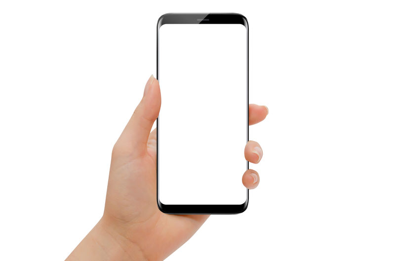 手持现代智能手机圆形边缘与白色背景隔离