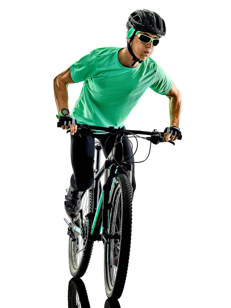 一个白种人在练习山地自行车背景是白色有阴影