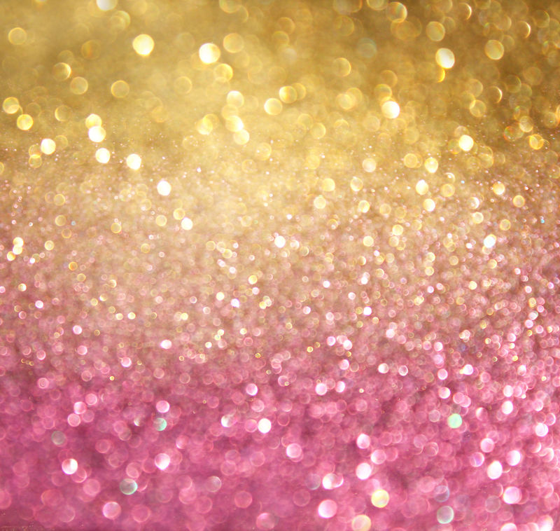 金色和粉色的抽象博克灯-散焦背景