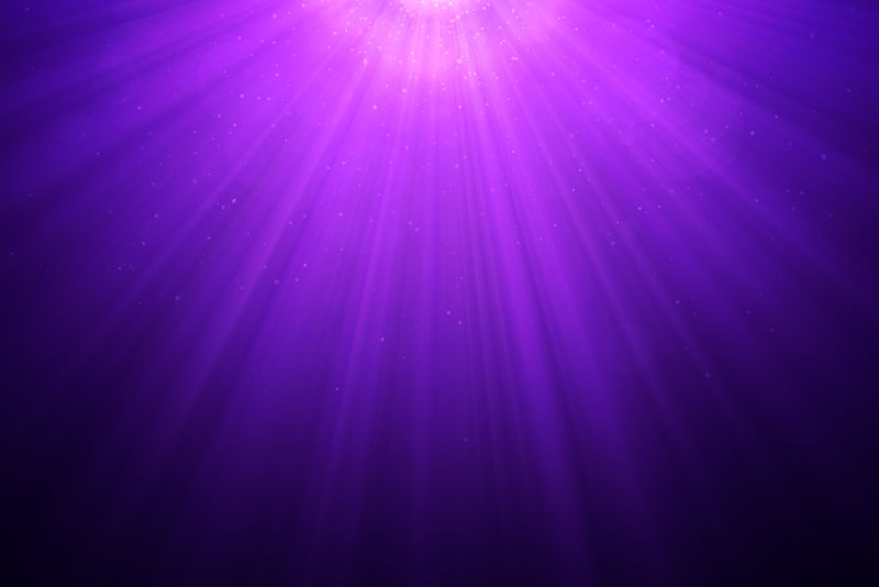 深紫色背景上的抽象光