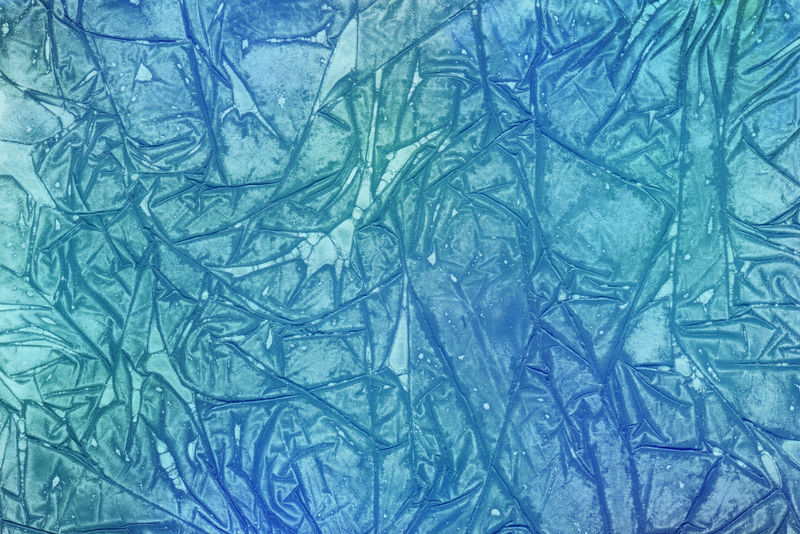 彩色的冬季蓝色墨水和白色纸张背景上的水彩画纹理-油漆泄漏和暗效果