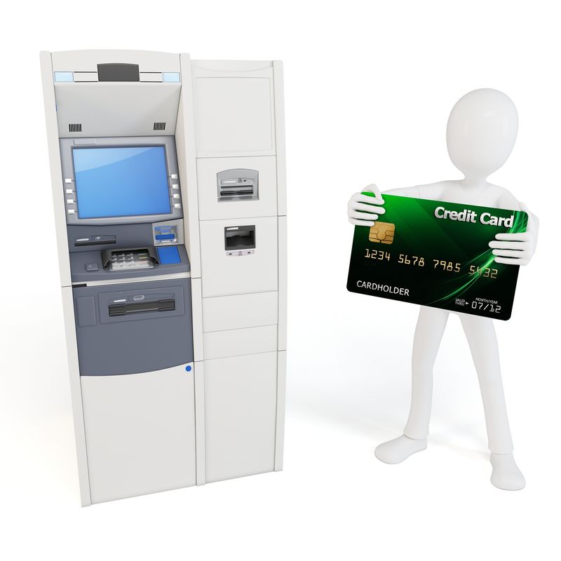 3D人-自动取款机和信用卡隔离在白色上