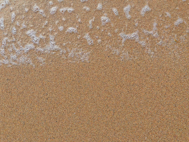 斯里兰卡-亚洲-沙滩天堂海滩上的白色海底泡沫特写