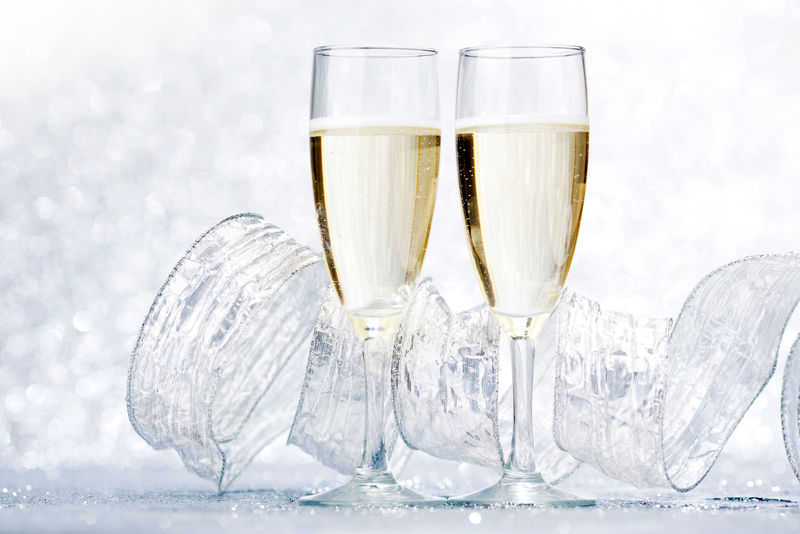闪亮背景香槟新年贺卡