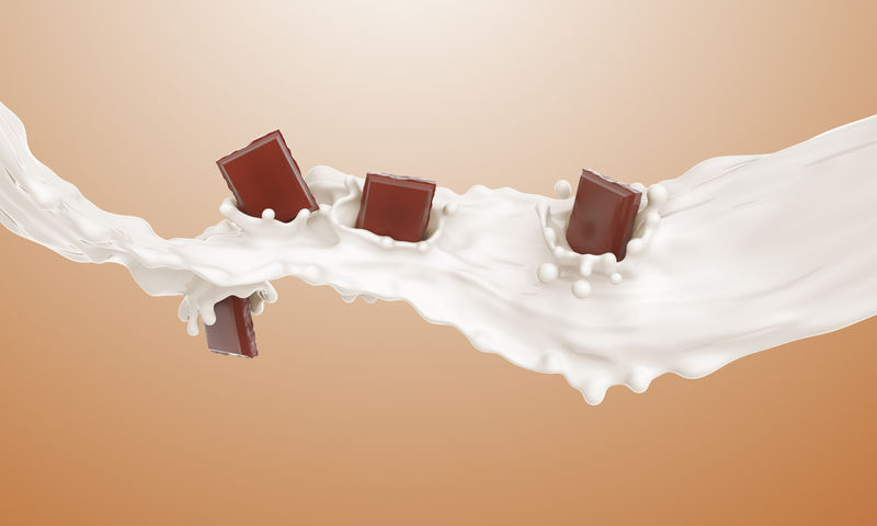一块巧克力掉在牛奶流里溅起水花