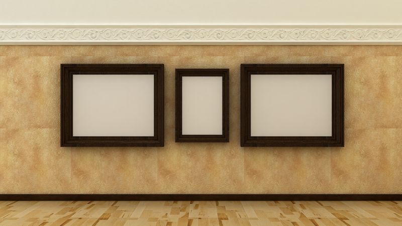 古典豪华室内背景中的空画框，装饰性油漆墙，带石膏装饰元素和木地板。复制空间图像。