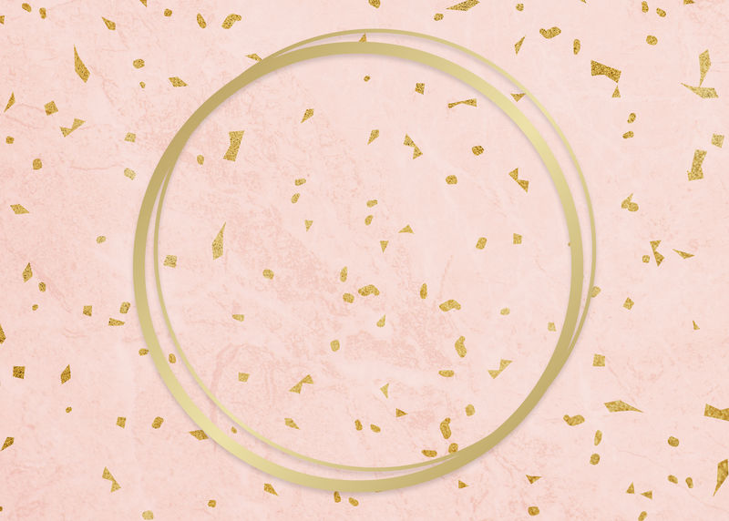 粉红色图案背景上的金色圆形框架
