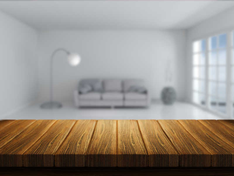 白色客厅里的木质桌子