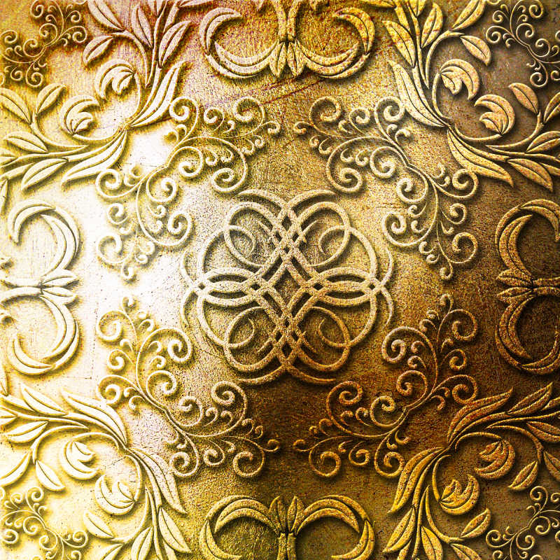 金色金属板上的花纹背景