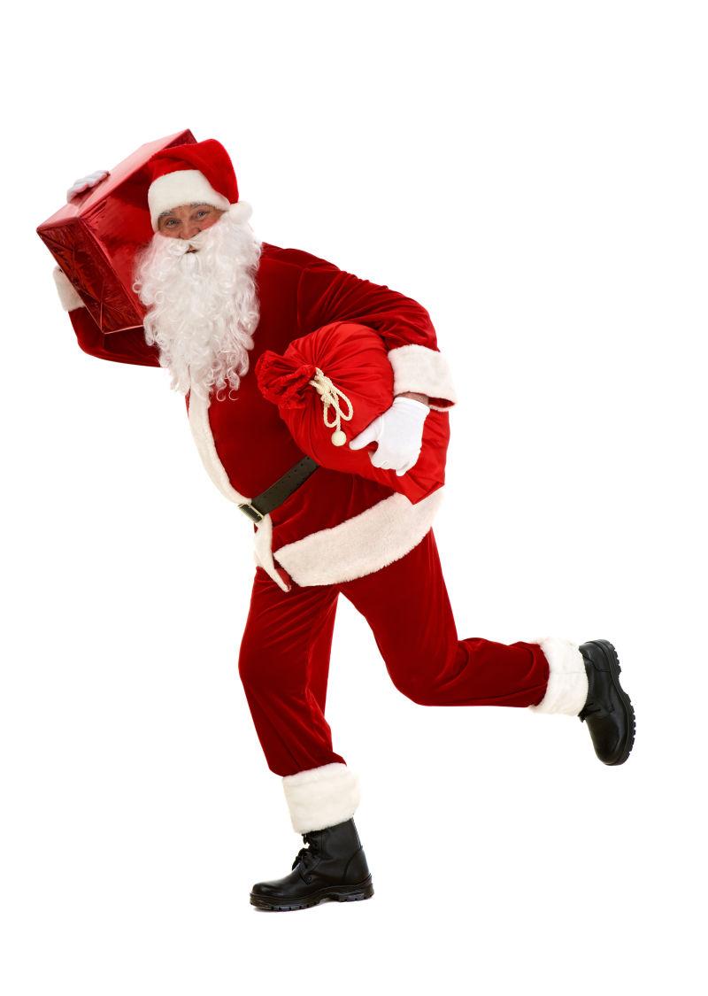 白色背景下抱着礼物奔跑的圣诞老人