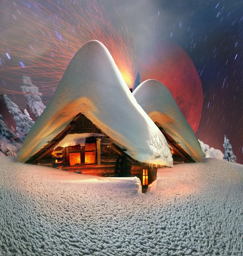高山上小屋子下着厚厚的雪