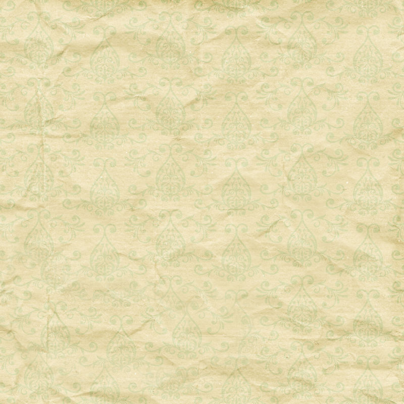 印着绿色复古花纹的褶皱纸张